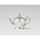 An Amsterdam miniature silver tea kettleBombé form kettle with slip lid and curved handle. H 4 cm,