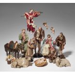 An extensive Neopolitan nativity scenePolychrome terracotta and wood figures with glass eyes, fabric