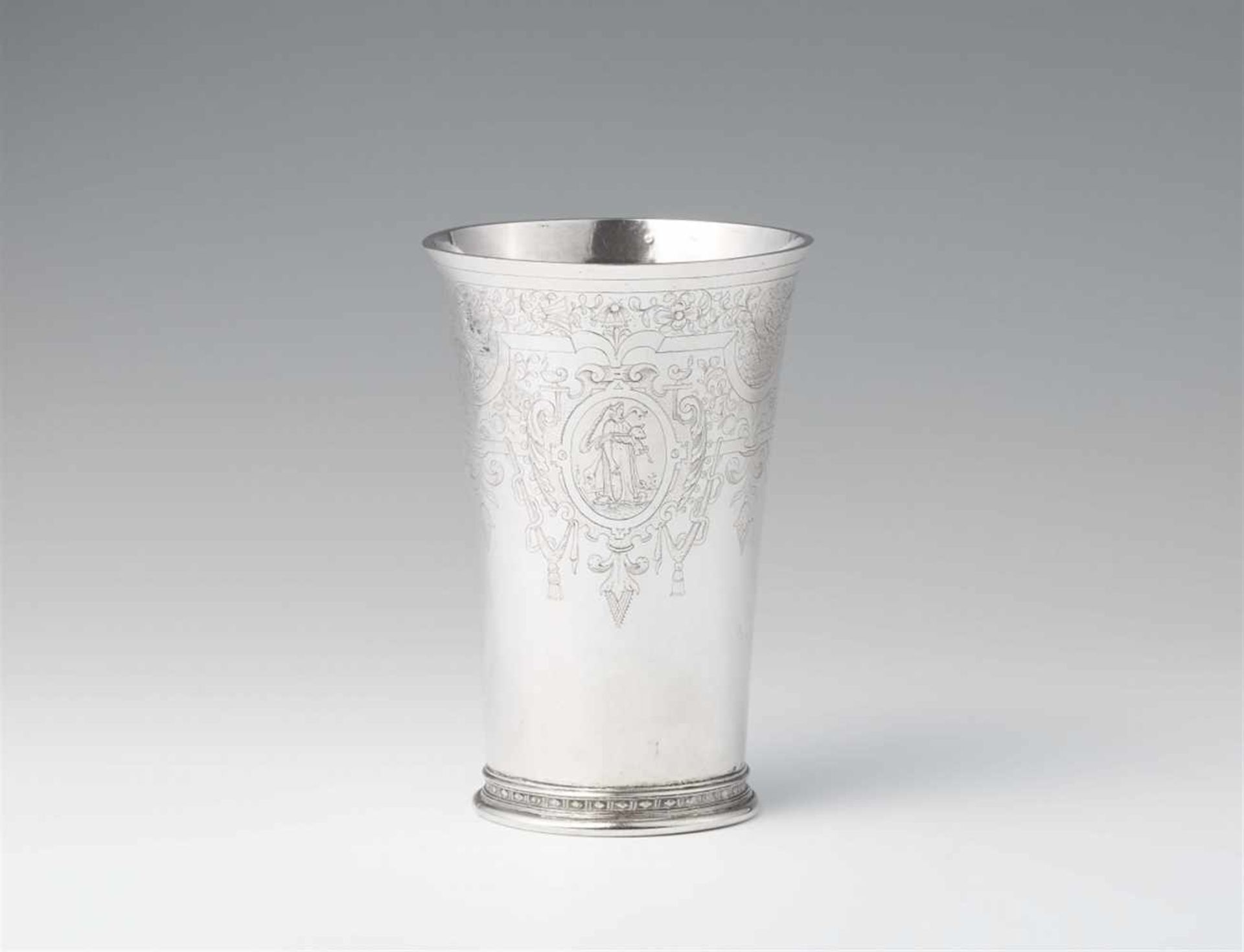 A large Cologne Renaissance silver beakerConical beaker with flaring rim on a moulded basal ring.