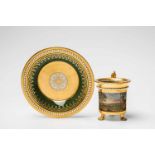 A romantic Ludwigsburg porcelain cupCylindrical form with pad feet and original saucer. Gold FR