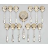 A Moscow parcel gilt silver ice cream cutlery setComprising 12 spoons and a large serving piece. The