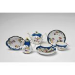 Five items from a Meissen porcelain service with mosaic bordersComprising a teapot and cover, milk
