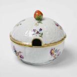 A Meissen porcelain box and cover with a strawberry finialBlue crossed swords mark. D 13.1 cm. Mid-