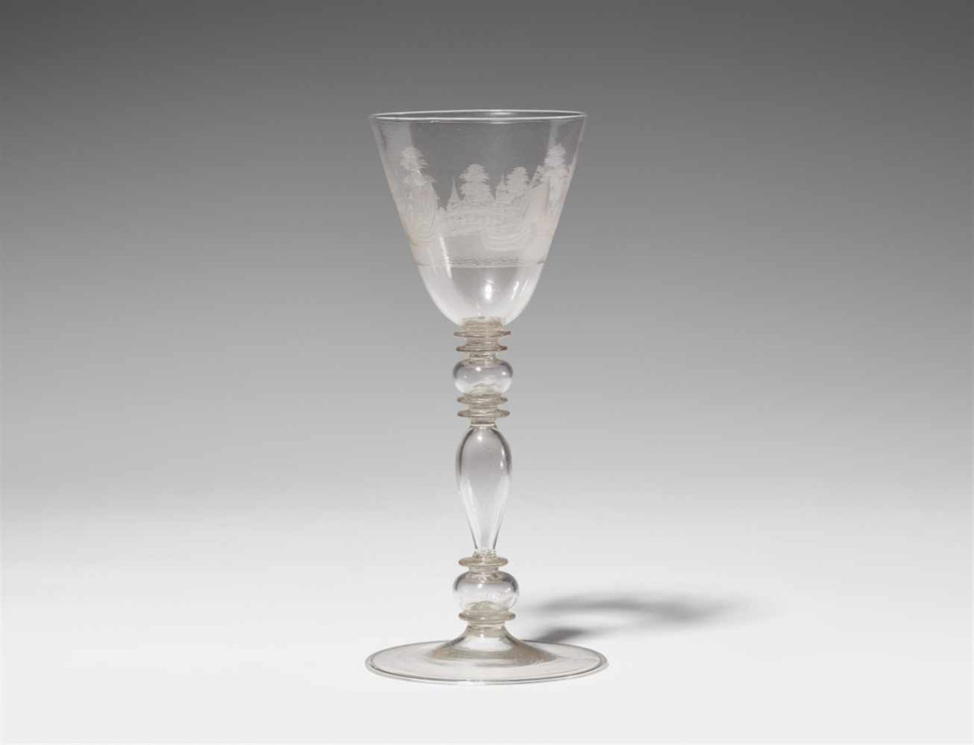 A Franconian glass goblet with a river landscapeDecorated with a city view and sailing boats. The