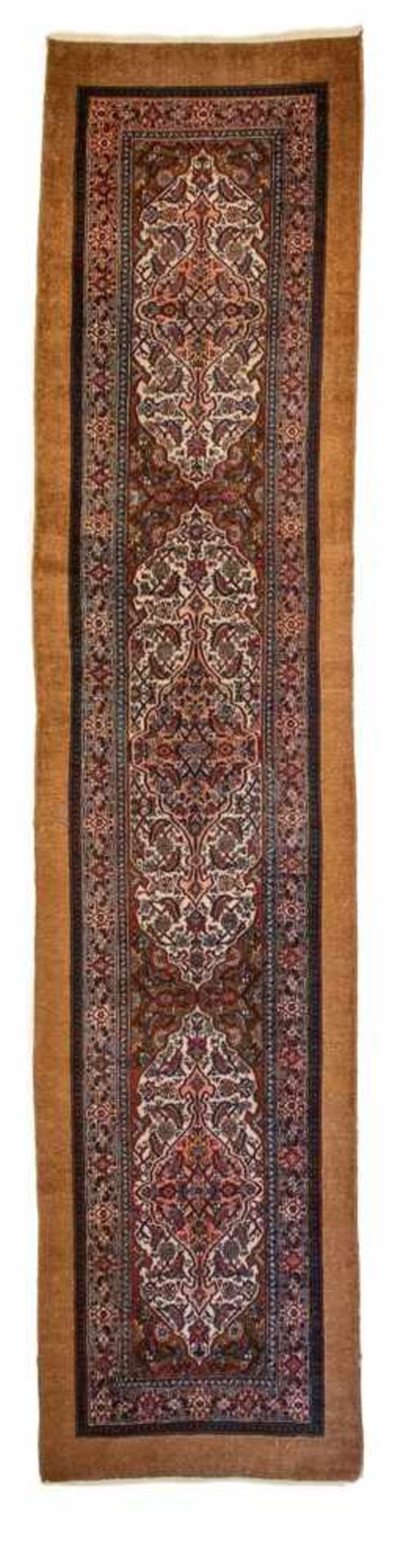 An Iranian Hamadan carpetWool and cotton. Monochrome camel hair coloured borders. Repaired. 453 x