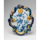 A Dutch Delft faience chinoiserie plaqueUnmarked. Two drilled hanging holes, minor bald patches in
