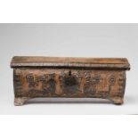 A Tuscan walnut cofferSmall coffin shaped box with wrought iron mountings and vellum lining. With