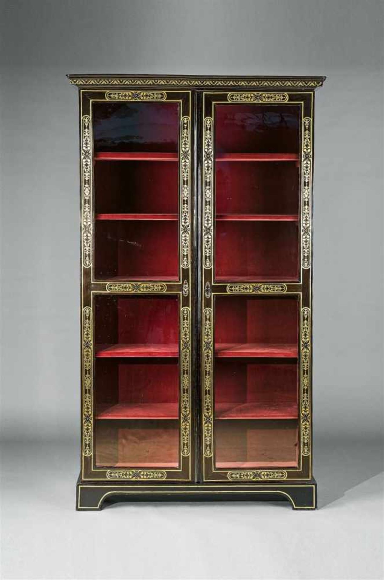 A Louis XIV style library cabinetEbonised wood and brass inlays on softwood, glass, later red velvet