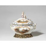 A Meissen porcelain tureen with views of the Utrechter VechtWith later gilt bronze mountings. An