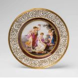 A rare Berlin KPM porcelain plate "puni par les Grâces"Model no. 1113, painted to the centre with