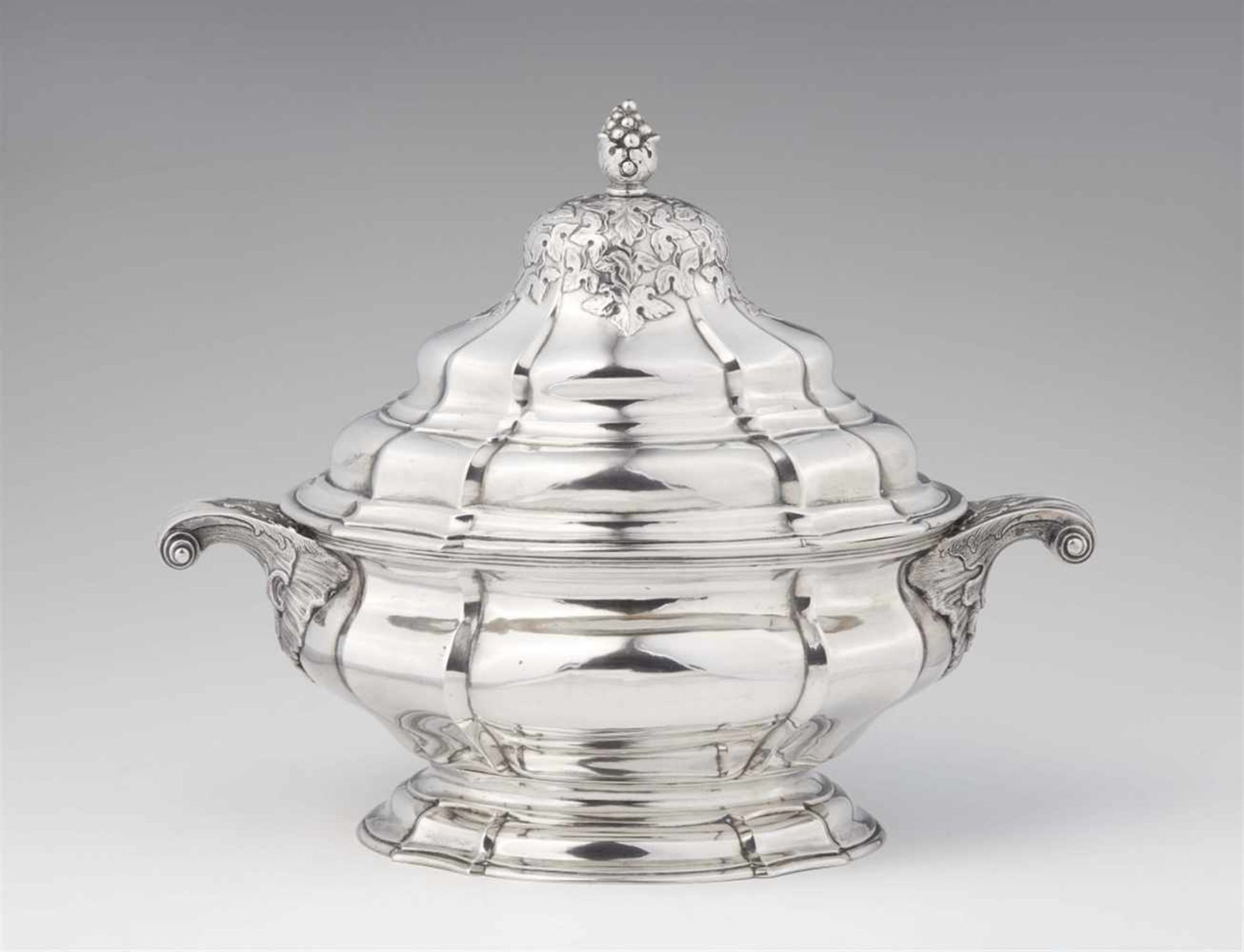 An important Reval silver tureen and coverA bombé form interior gilt oval tureen with handles to