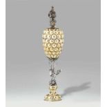 An important Renaissance parcel gilt silver goblet with a "büttenmann" motifGadrooned base