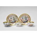 Five items from a Meissen porcelain service with bird and rock decorComprising three tea bowls and