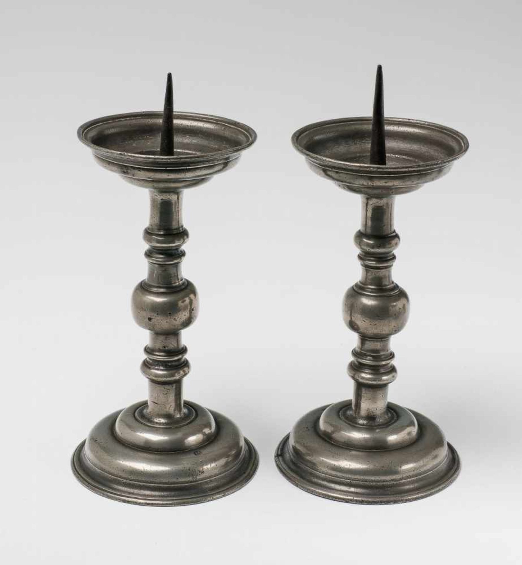 A pair of Cologne tin altar candlesticksWith iron prickets. Three crown mark with F.D. H ca. 27.5