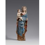 An Austrian carved wood figure of the Virgin and Child, circa 1430/40Carved in the round. With