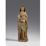 A carved sandstone figure of the Virgin and Child, probably Northern French, first half 15th