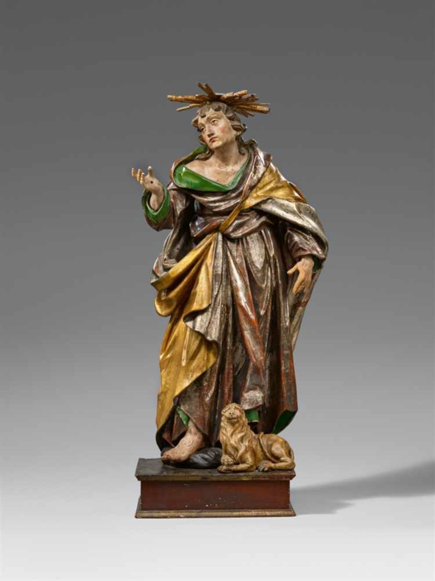 A carved wood figure of Saint Mark, workshop of Johann Peter Schwanthaler the ElderCarved three-