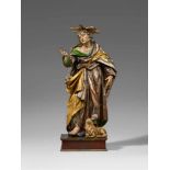 A carved wood figure of Saint Mark, workshop of Johann Peter Schwanthaler the ElderCarved three-