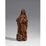 A South Netherlandish carved oak figure of Saint Catherine, second half 15th centuryCarved in the