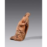 A clay figure of Saint Joseph from a Nativity scene, probably Landshut, circa 1520Fired clay, worked