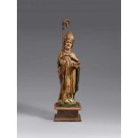 A carved wood figure of Saint Eligius by Hans KlockerCarved in the round, the reverse partially