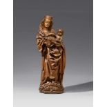 A carved wooden figure of the Virgin on the crescent by Jakob KaschauerCarved three-quarters in