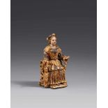 A 17th century carved wooden figure of an enthroned saint, probably FlemishCarved in the round and