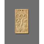 A 15th century French carved ivory Crucifixion reliefWith minimal remains of partially overpainted