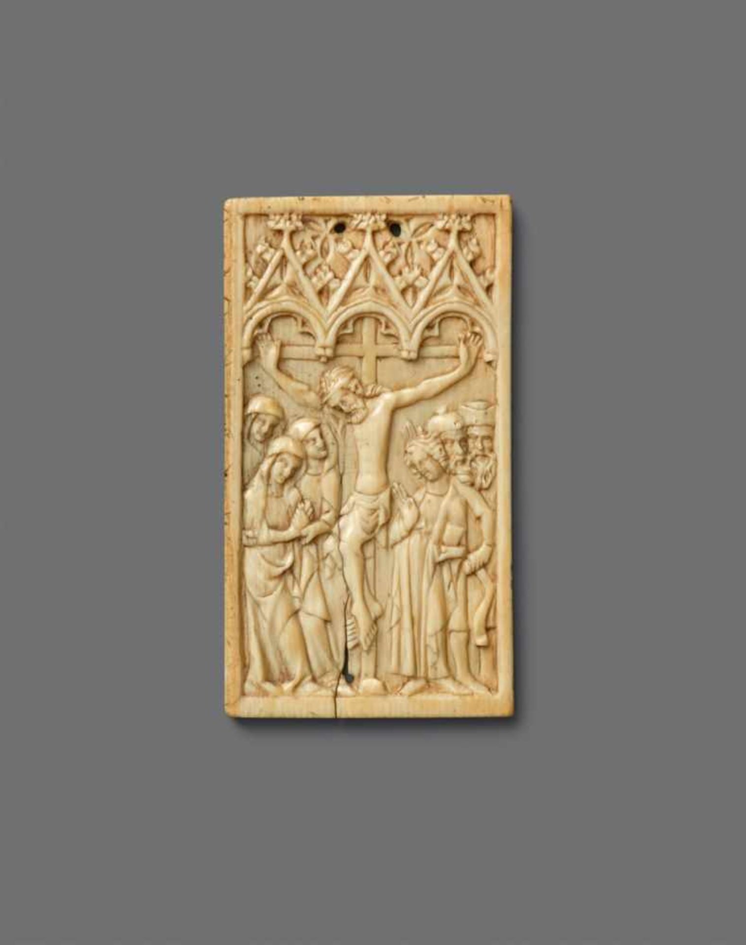 A 15th century French carved ivory Crucifixion reliefWith minimal remains of partially overpainted