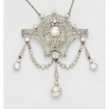 A Belle Epoque platinum and diamond pendant necklaceDesigned as a pierced festooned cartouche