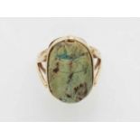 A 14k gold ring with an ancient scarab amuletSet with a carved scarab made from turquoise glazed