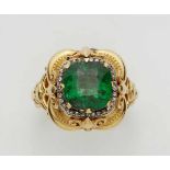 An 18k gold and emerald Historicist ringThe band and domed quatrefoil bezel with Historicist