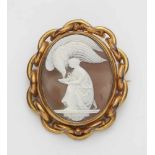 A gilt copper cameo broochShell cameo carved with a detailed depiction of Hebe feeding Zeus in the