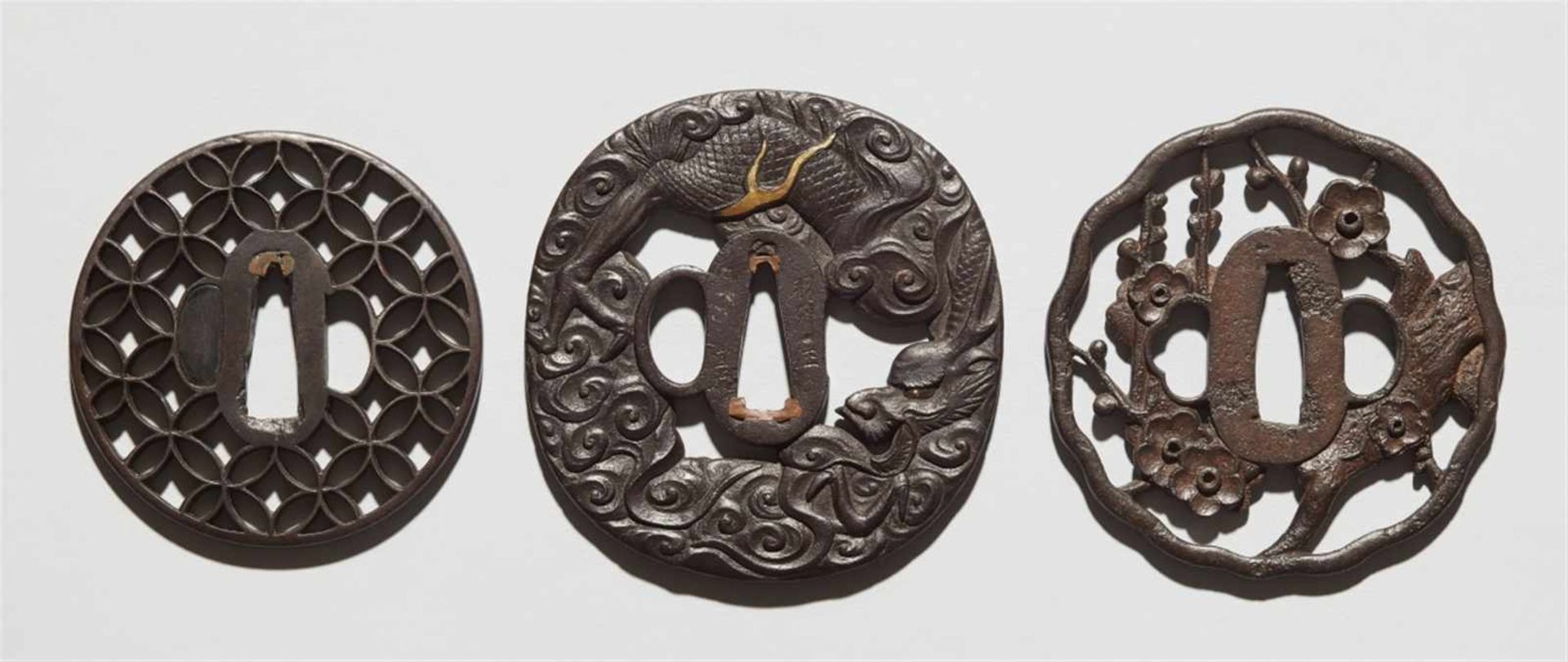 Three iron tsuba. 18th/19th century