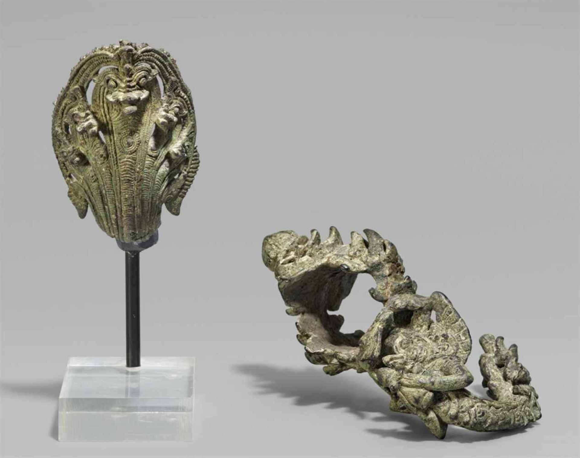 Two Khmer bronze pieces. Cambodia, Angkor Wat style. 12th century