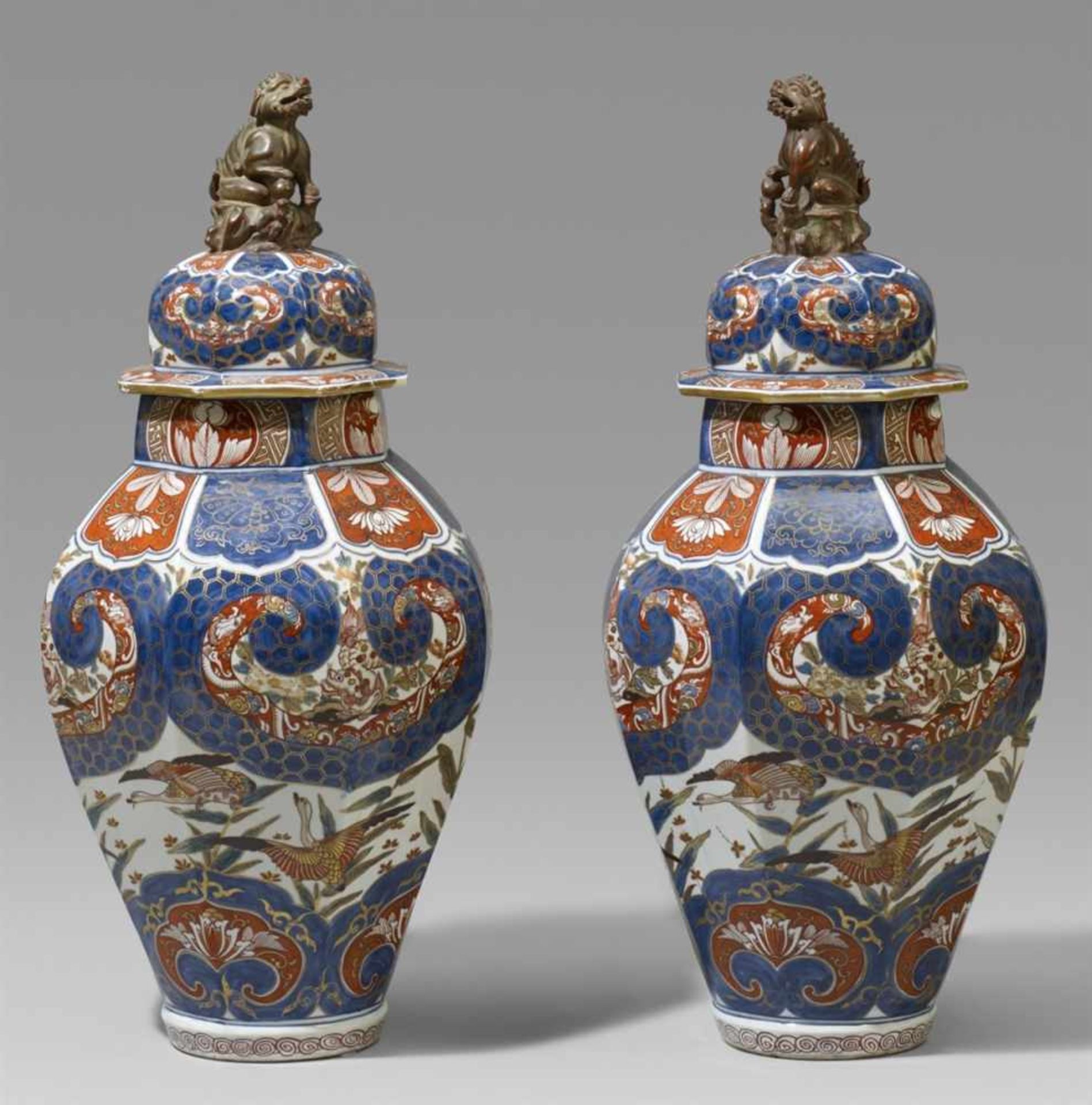 A pair of Samson lidded baluster vases. 19th century