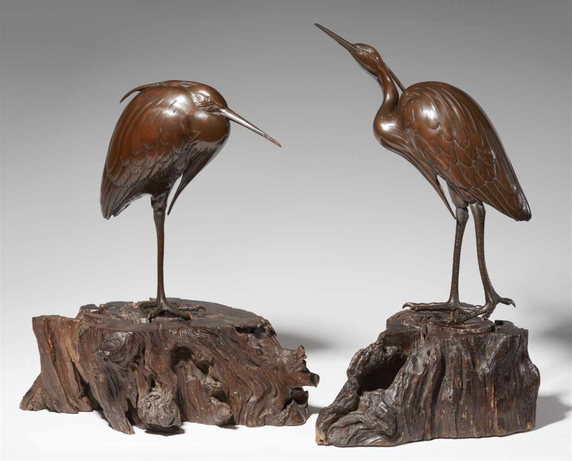 A pair of bronze models of herons. Around 1900