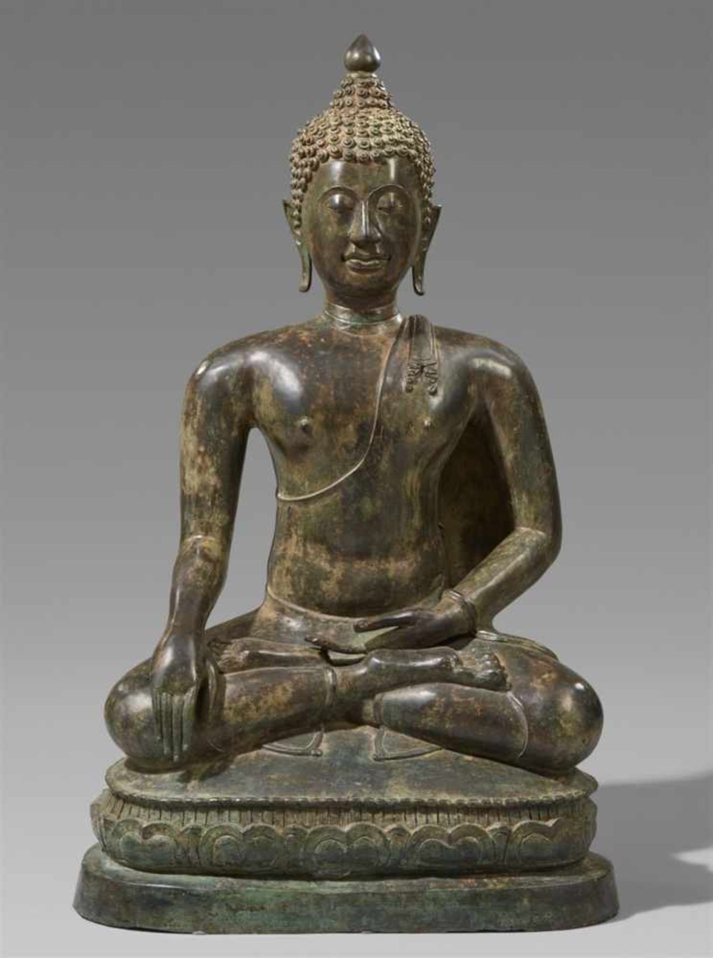 A very fine Northern Thai bronze figure of Buddha Maravijaya. 15th century