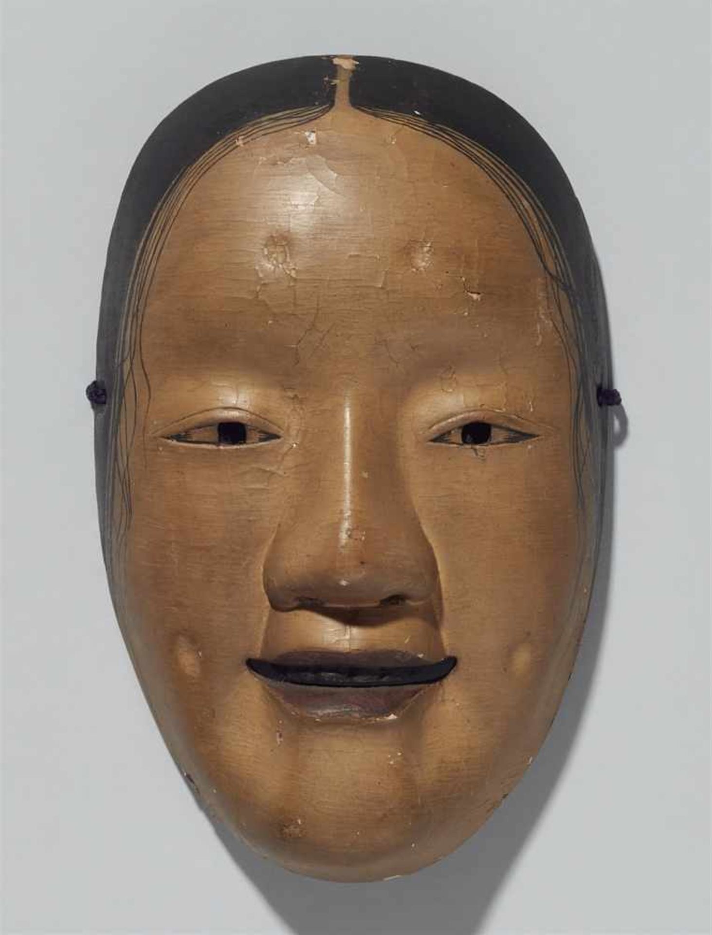 A painted wood nô mask. 19th century<