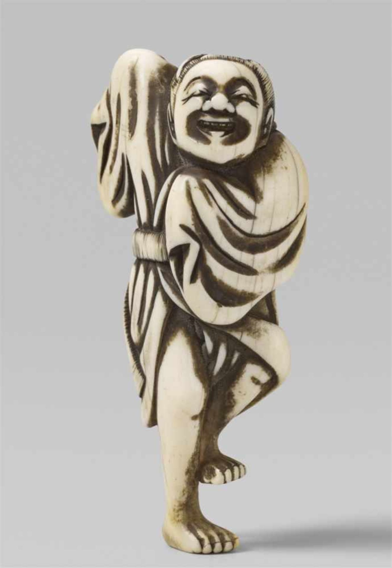An ivory netsuke of a dancer. Early 19th century