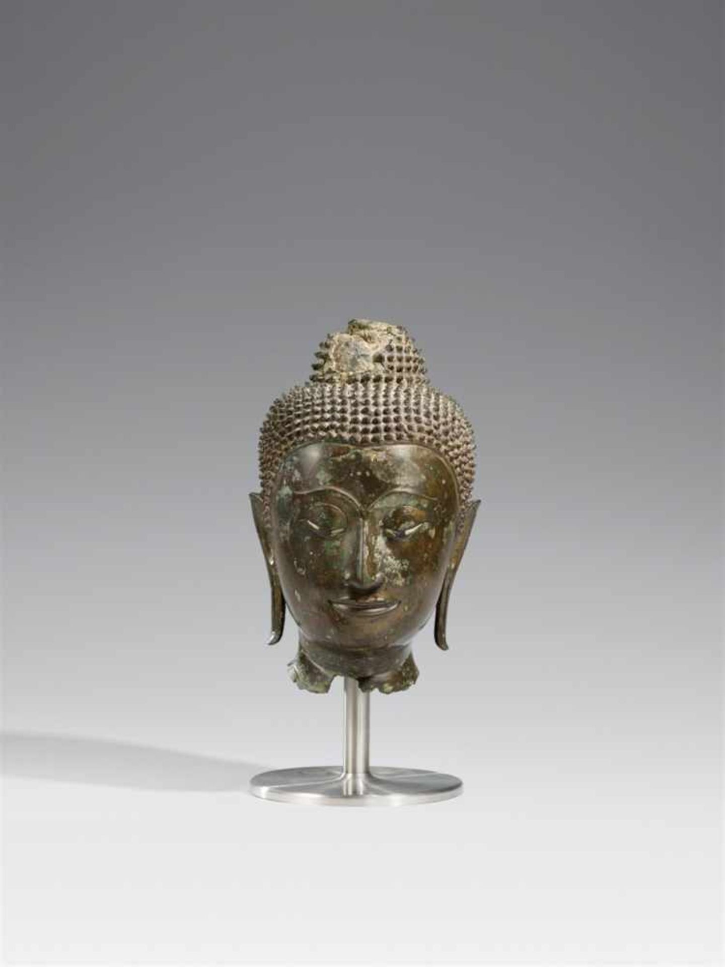 A Sukhothai bronze head of Buddha. 15th century