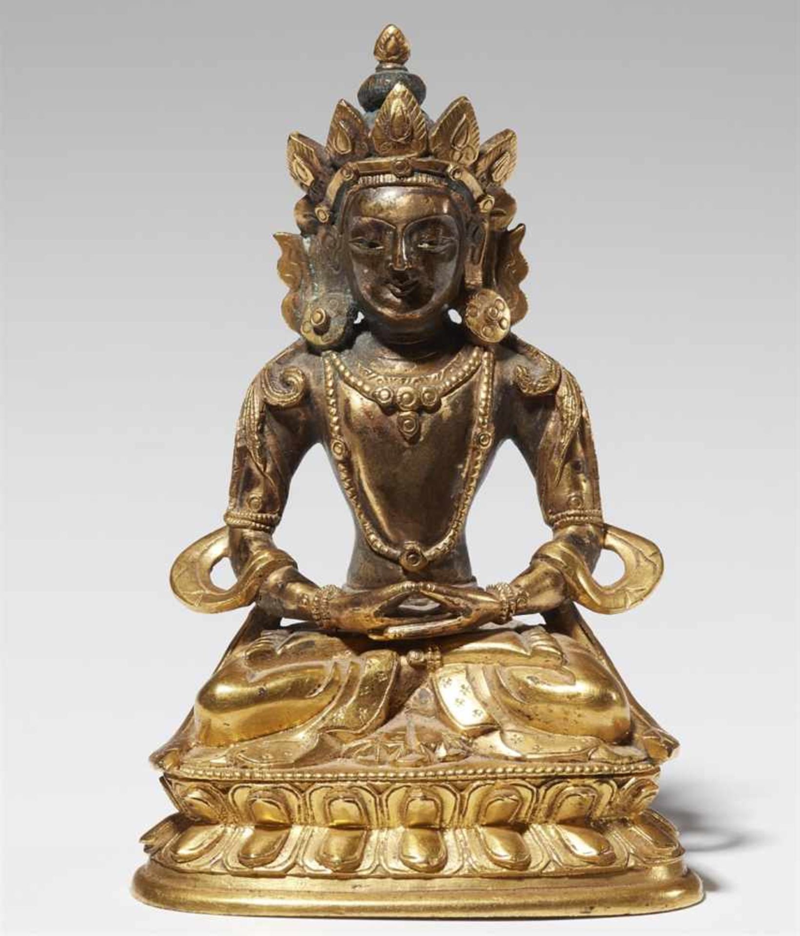 A Tibeto-Chinese gilt bronze figure of Buddha Amitayus. 18th century.
