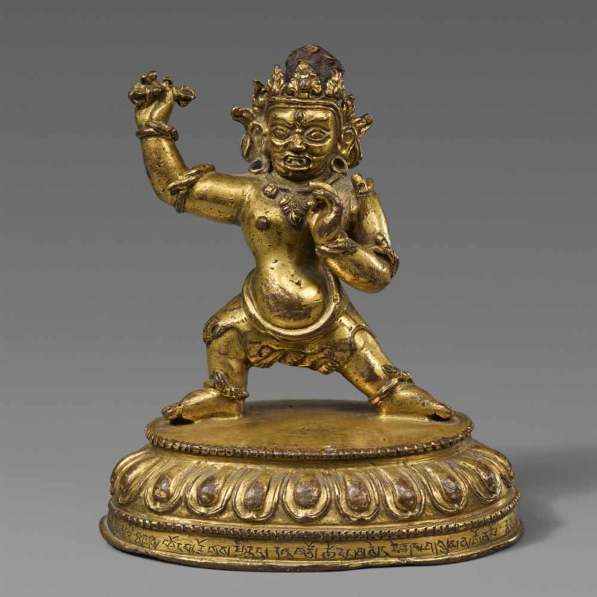 A Tibetan gilt bronze figure of Vajrapani. 15th century