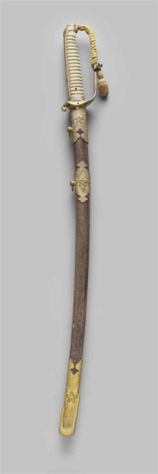 A katana blade in shirasaya with shinguntô koshirae<
