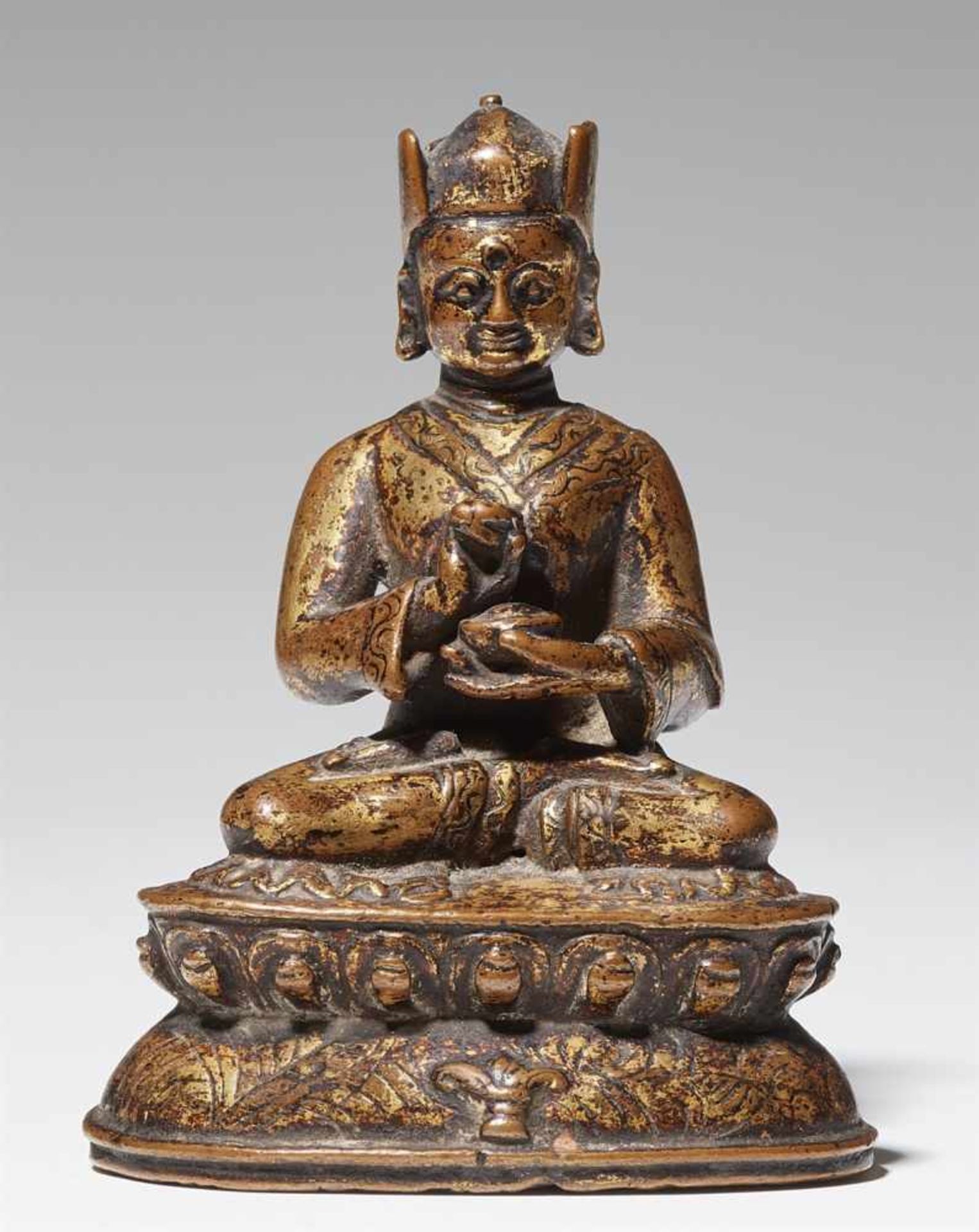 A Tibetan bronze figure of Padmasambhava. 17th/18th century