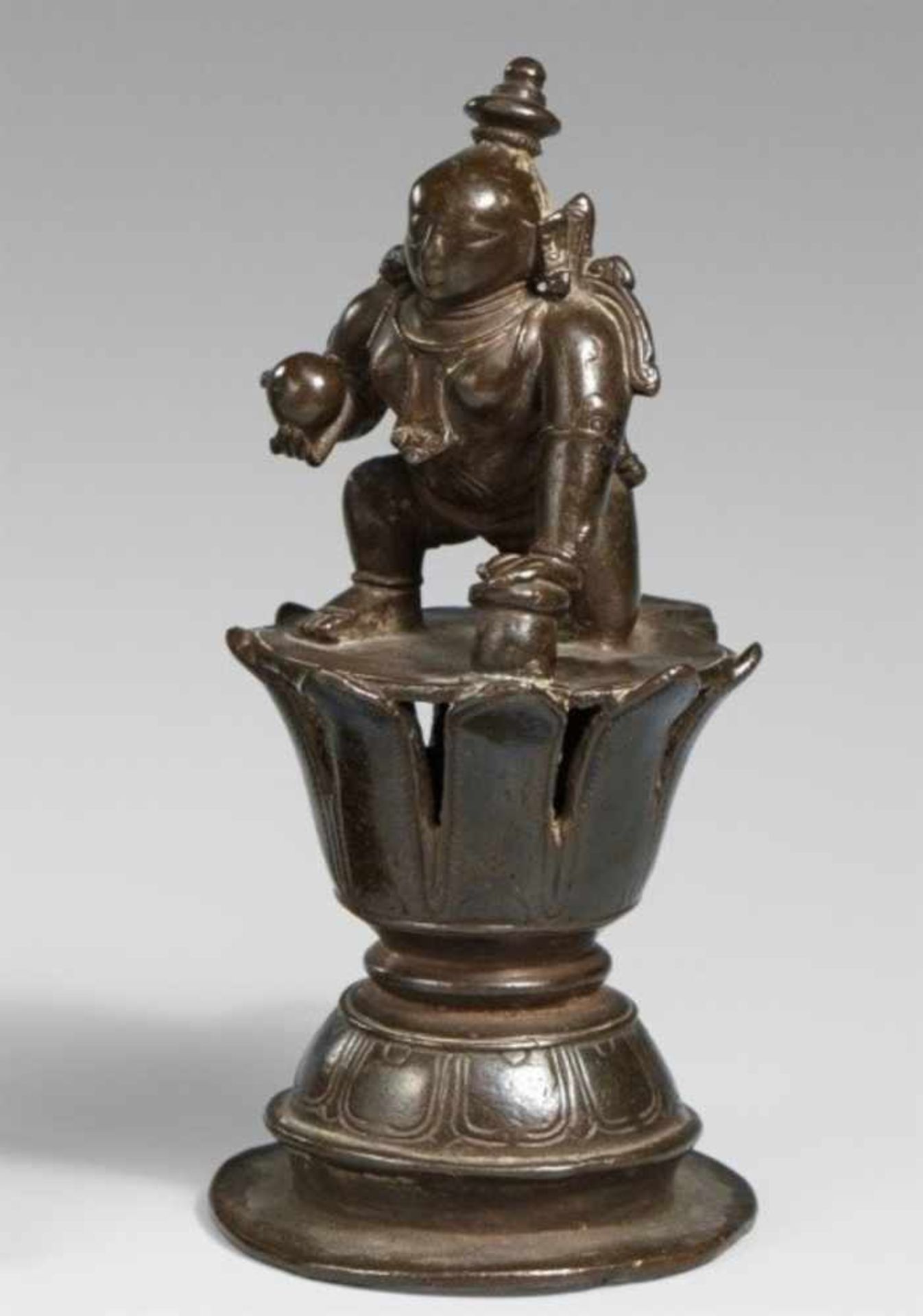 A South Indian copper alloy figure of Bala-Krishna. 14th/15th century