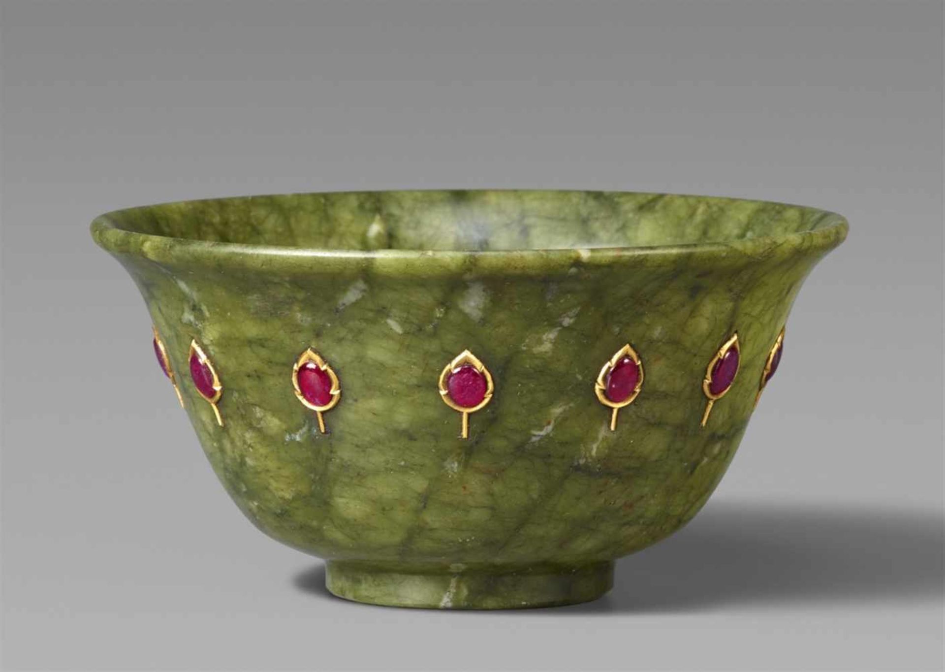 A small North Indian Mughal style moss-green nephrite bowl