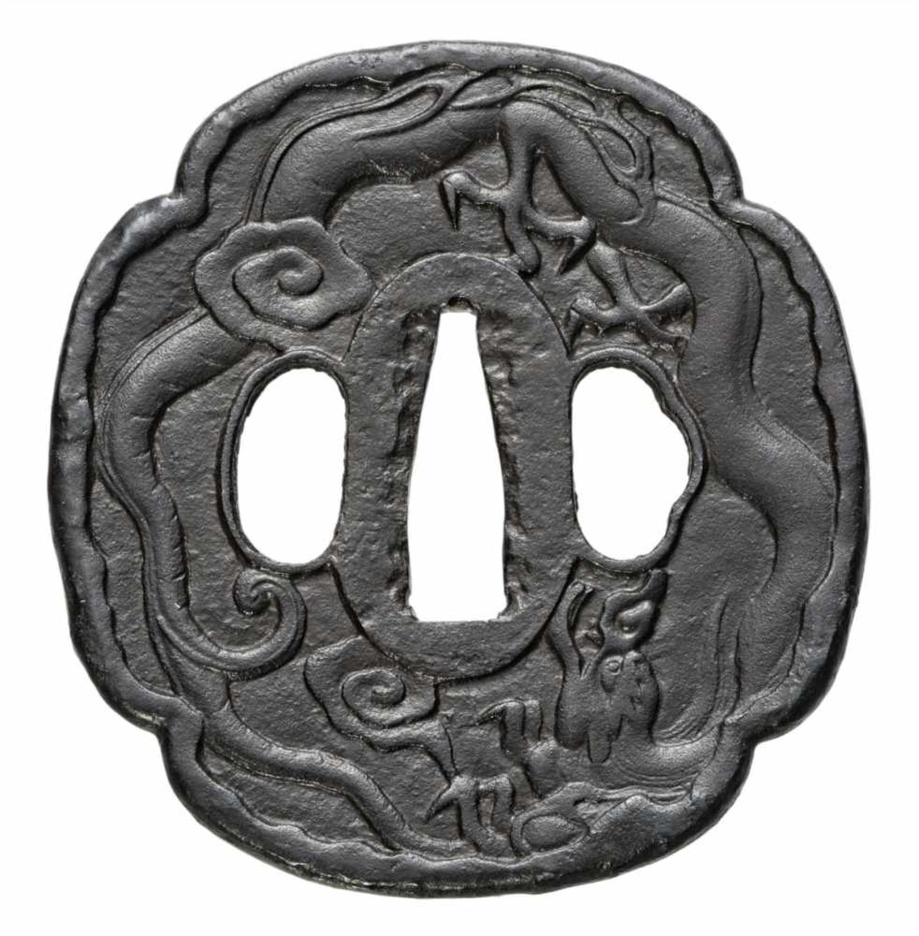 An iron tsuba. Edo period
