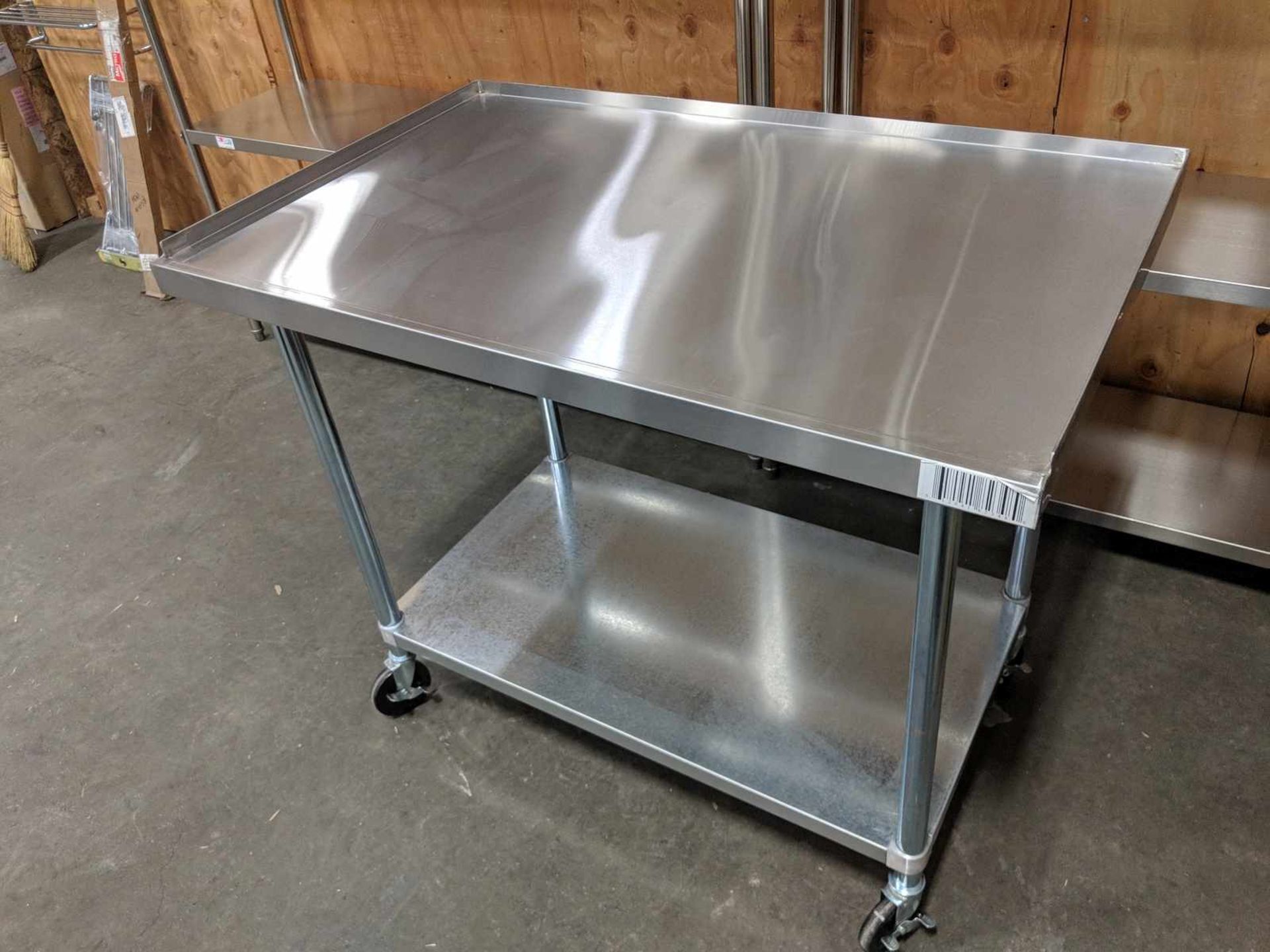 30" x 49" x 40" Work Table with 1" Lip and Casters