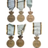 Lot of 9. The Centennial Medal, instituted on 5th of May, 1939